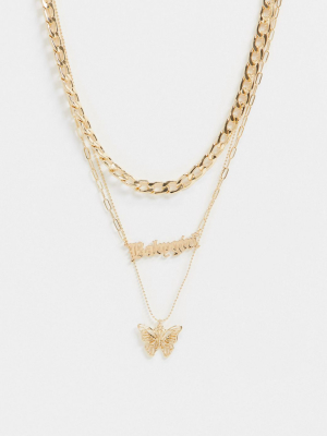 Asos Design Multi-strand Necklace With Gothic Babygirl And Butterfly Pendants In Gold Tone