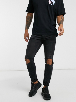 Topman Stretch Skinny Jeans With Blowout Rips In Washed Black