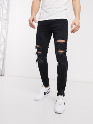 Bershka Super Skinny Jeans With Rips In Black