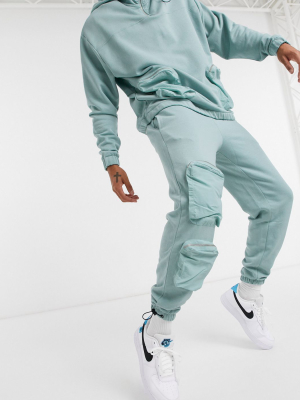 Asos Design Tapered Sweatpants With Nylon Utility Pockets In Blue Gray