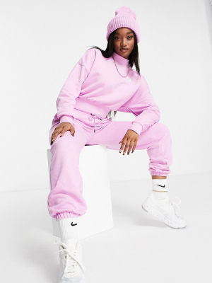 Nike Essentials Cropped Mock Neck Sweatshirt In Pink