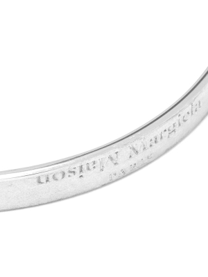 Maison Margiela Flipped Logo Cuff Bracelet - Palladio Burattato