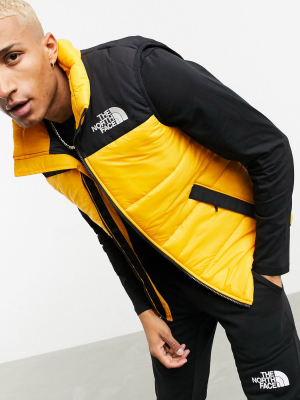 The North Face Himalayan Insulated Vest In Yellow