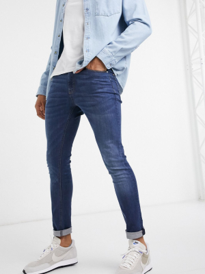 Asos Design Super Skinny Jeans In Dark Wash