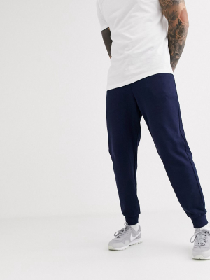 Asos Design Organic Tapered Sweatpants In Navy