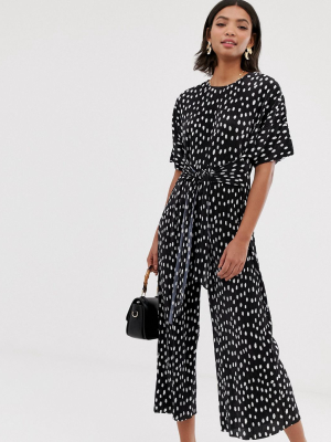 Asos Design Plisse Tie Front Jumpsuit In Polka Dot