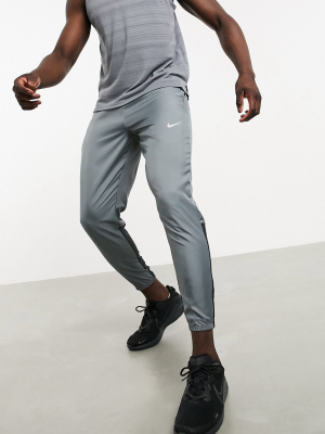 Nike Running Essential Woven Pants In Gray