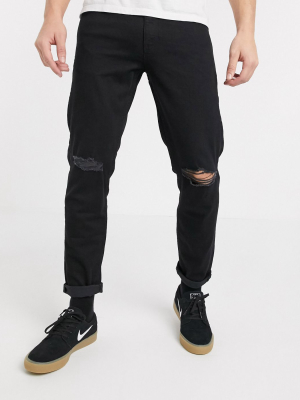 Asos Design Stretch Tapered Jeans In Black With Knee Rips