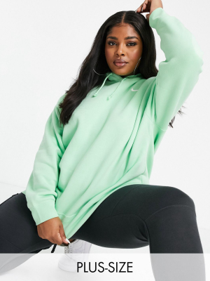 Nike Plus Mini Swoosh Oversized Hoodie With Tuck Sleeve Detail In Green