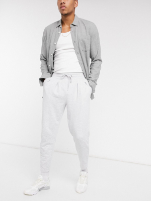 Asos Design Tapered Sweatpants With Pleats In White Marl