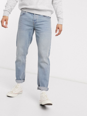 Asos Design Tapered Jeans With Dusty Tint