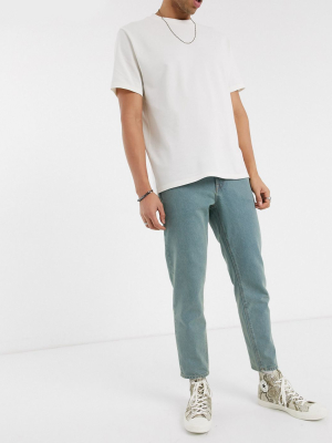 Asos Design Classic Rigid Jeans In Tinted Light Wash Blue