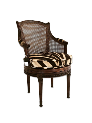 Antique Bergere Swivel Chair In Zebra Hide