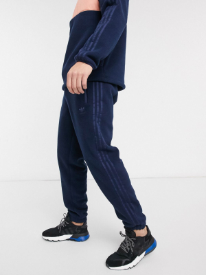 Adidas Originals Polar Fleece Sweatpants With Reflective Details In Navy Tech Pack