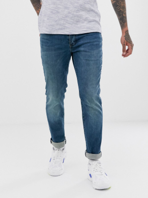 Topman Slim Jeans In Mid Wash Blue